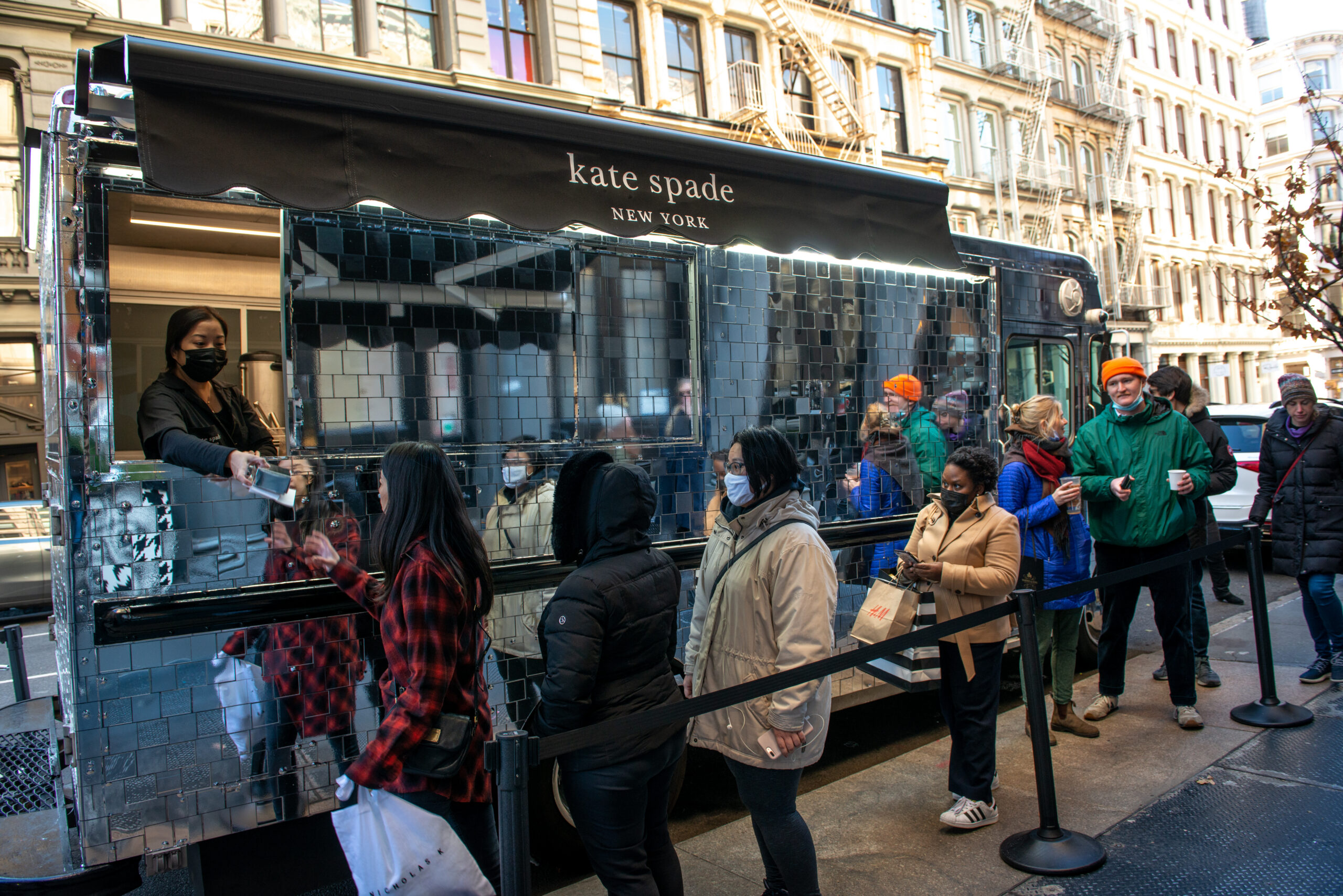 Customers lined up at the Kate Spade branded mobile activation in New York City.